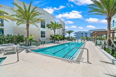 Experience Boca's Beauty from this Lanai Residence with a