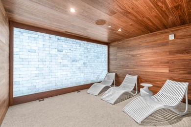 Experience Boca's Beauty from this Lanai Residence with a