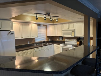 LOWEST PRICED CONDO OF THIS STATURE ON WORLD RENOWED SIESTA KEY