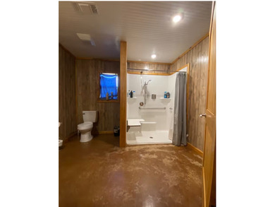 Enjoy lake living at its best in this spacious 4-bedroom, 2-bath