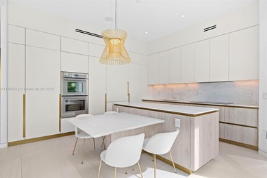 Experience luxury coastal living in this fully renovated 3-story