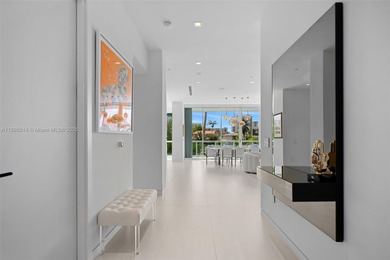 Experience luxury coastal living in this fully renovated 3-story