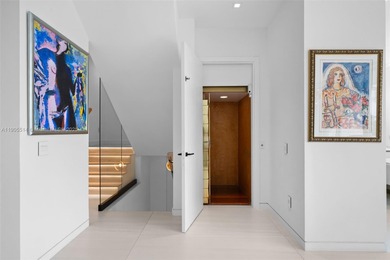 Experience luxury coastal living in this fully renovated 3-story