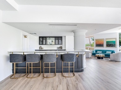 This is a magnificent condo, an entire half floor with almost 1