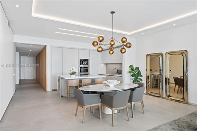 Experience refined oceanfront living in Residence 401 at the