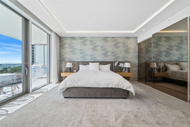 Experience refined oceanfront living in Residence 401 at the