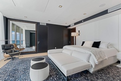 This extraordinary corner unit with unobstructed views,  Armani