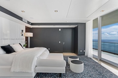 This extraordinary corner unit with unobstructed views,  Armani