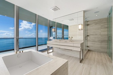 This extraordinary corner unit with unobstructed views,  Armani