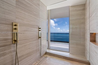 This extraordinary corner unit with unobstructed views,  Armani