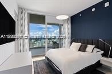 This extraordinary corner unit with unobstructed views,  Armani