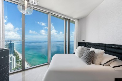 This extraordinary corner unit with unobstructed views,  Armani