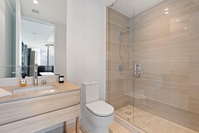 This extraordinary corner unit with unobstructed views,  Armani