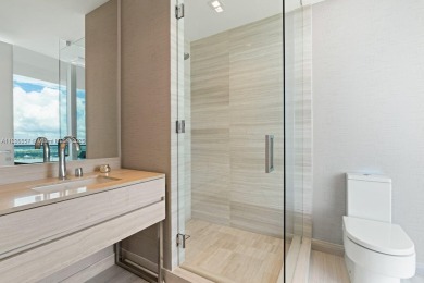 This extraordinary corner unit with unobstructed views,  Armani