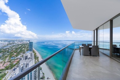 This extraordinary corner unit with unobstructed views,  Armani
