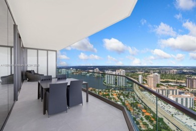 This extraordinary corner unit with unobstructed views,  Armani