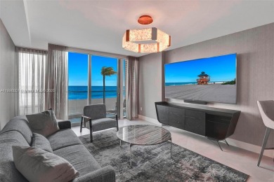 This extraordinary corner unit with unobstructed views,  Armani