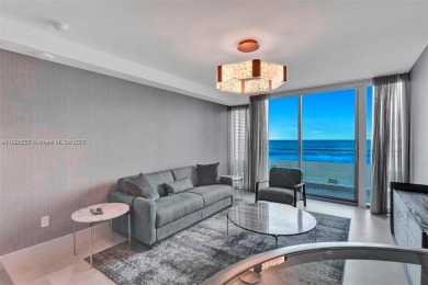 This extraordinary corner unit with unobstructed views,  Armani