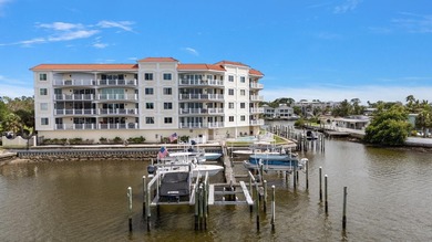 3 BEDROOMS, 2.5 BATHS, LARGE 2 CAR GARAGE AND A BOAT SLIP!