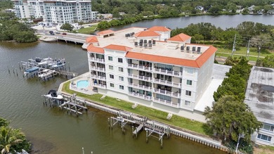 3 BEDROOMS, 2.5 BATHS, LARGE 2 CAR GARAGE AND A BOAT SLIP!