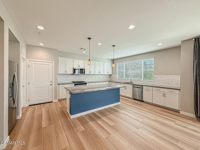 Welcome to The Westerly! This beautifully upgraded end-unit