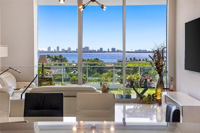 Live above it all at The Lexi! This stunning 2 bed + den / 2