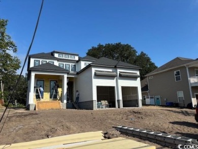 Just one block from the ocean, this brand-new custom-designed