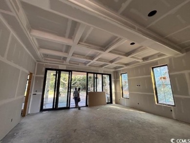 Just one block from the ocean, this brand-new custom-designed