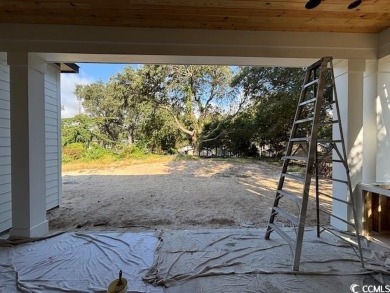 Just one block from the ocean, this brand-new custom-designed