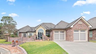 Gorgeous custom-built home located in the gated Shadows Bend