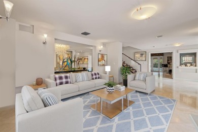 Upgraded lakefront 4-bedroom, 3.5-bath residence featuring a