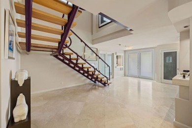 Upgraded lakefront 4-bedroom, 3.5-bath residence featuring a