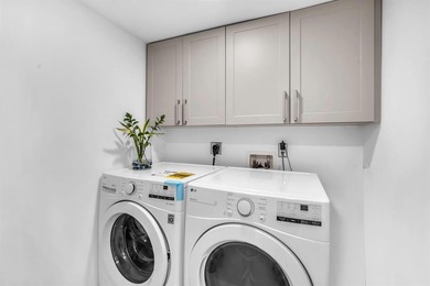 Impeccably renovated corner condo showcasing exceptional luxury