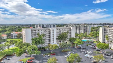 Impeccably renovated corner condo showcasing exceptional luxury