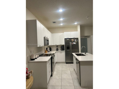 Property  occupied by tenants(3/2),silver steel appliances