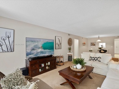 Step into this spacious CORNER unit featuring over 1400 sqft!