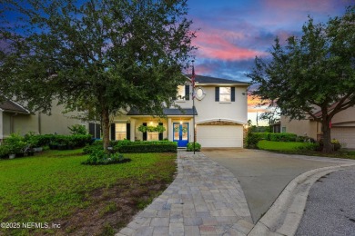 Embrace upscale, waterside living in this stunning two-story, 5