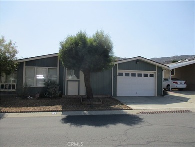 This spacious manufactured home is located in Maze Stone Village