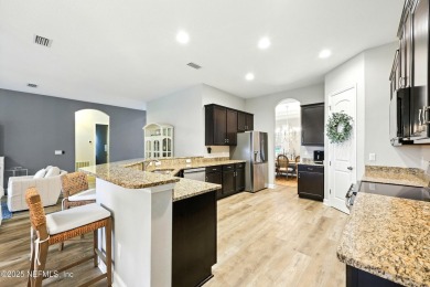 Embrace upscale, waterside living in this stunning two-story, 5