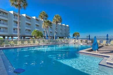 Own a fully furnished 1-bedroom, 1-bath waterfront condo in