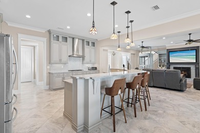 This canal-front home on Holiday Isle sits on a spacious corner