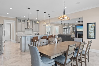 This canal-front home on Holiday Isle sits on a spacious corner