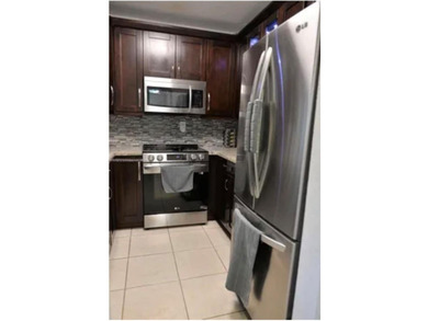 Step into this beautifully remodeled and move-in ready condo