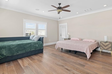 This canal-front home on Holiday Isle sits on a spacious corner