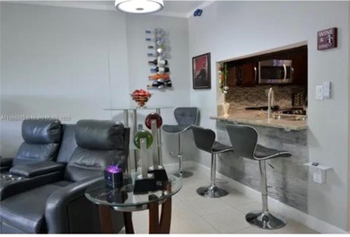 Step into this beautifully remodeled and move-in ready condo