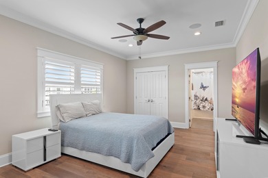 This canal-front home on Holiday Isle sits on a spacious corner