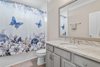 This canal-front home on Holiday Isle sits on a spacious corner