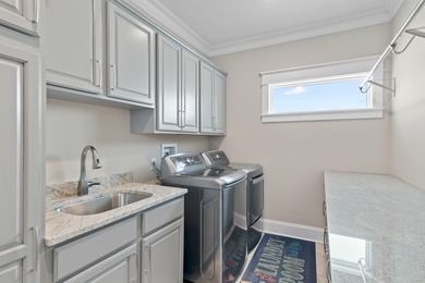 This canal-front home on Holiday Isle sits on a spacious corner