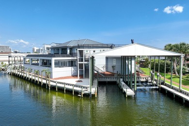 This canal-front home on Holiday Isle sits on a spacious corner