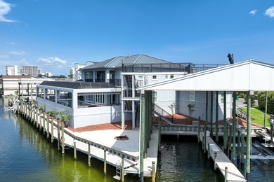 This canal-front home on Holiday Isle sits on a spacious corner